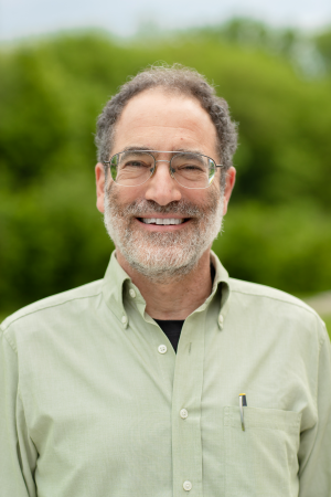 photo of Andy Robinson smiling at the camera