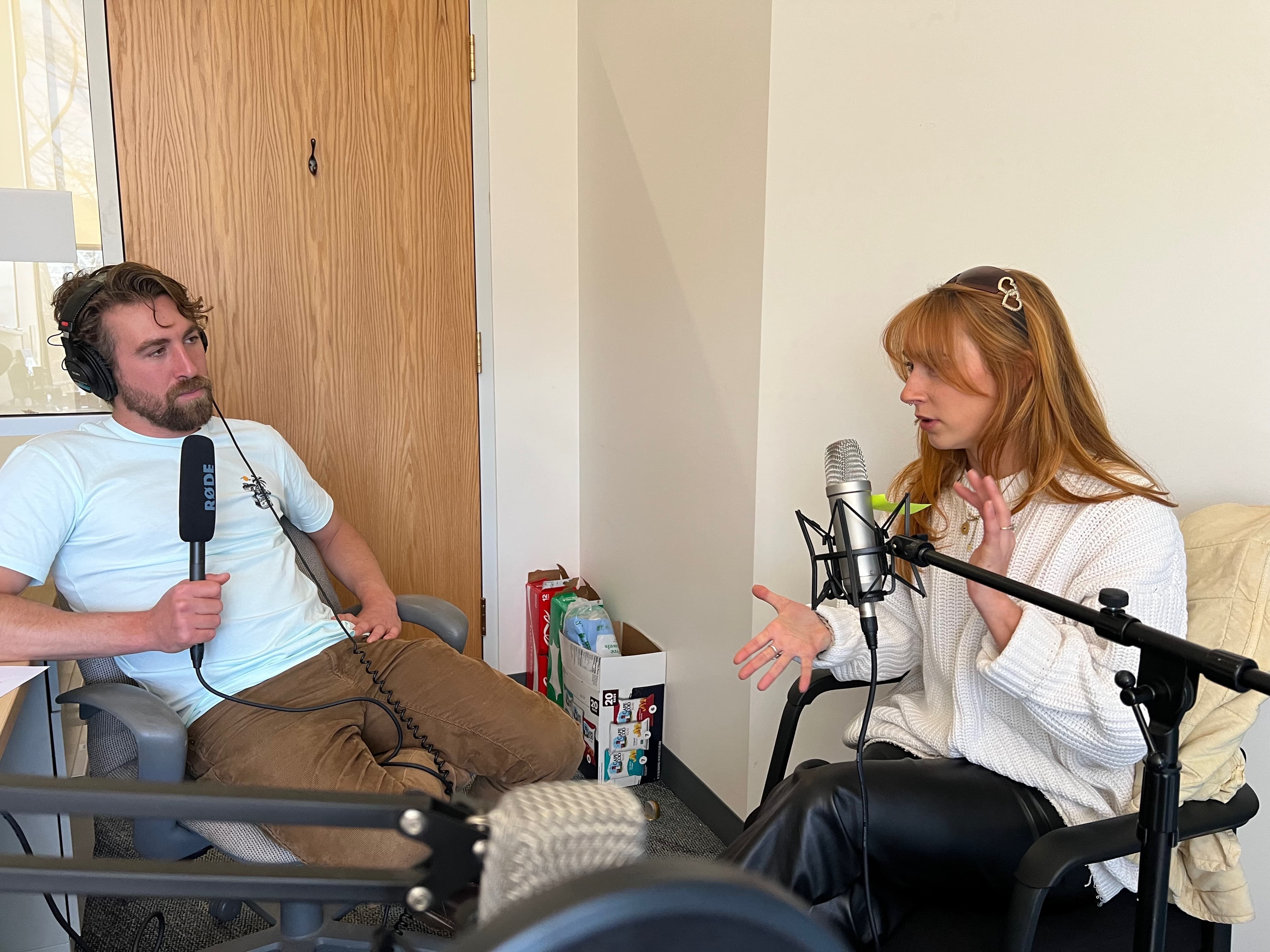 Podcast hosts in conversation