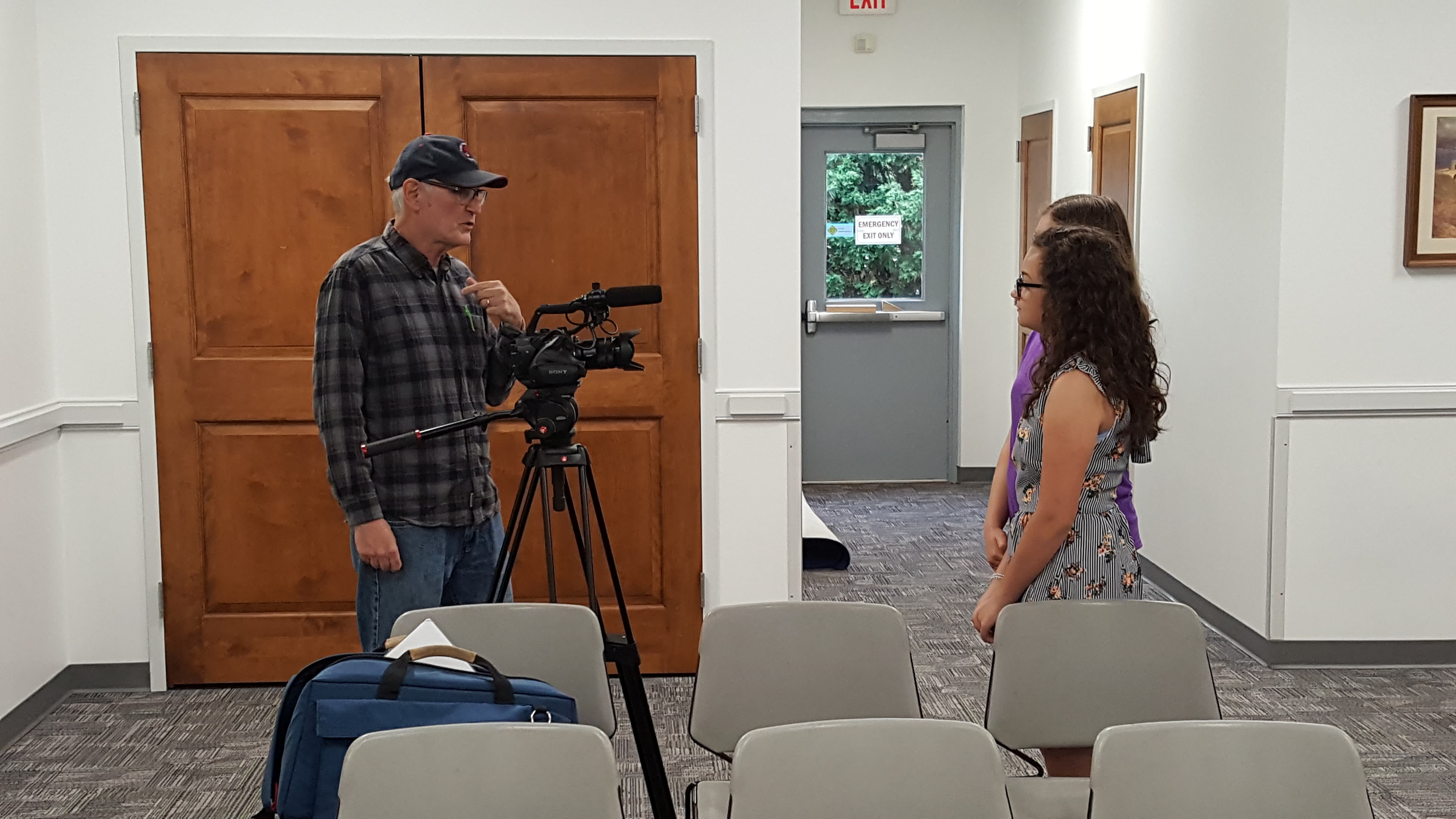 Students communicate information about their investigations to a local TV station