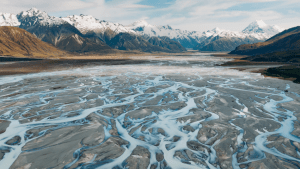 Landscape photo of mountains and braided river channels