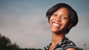 woman smiling outdoors