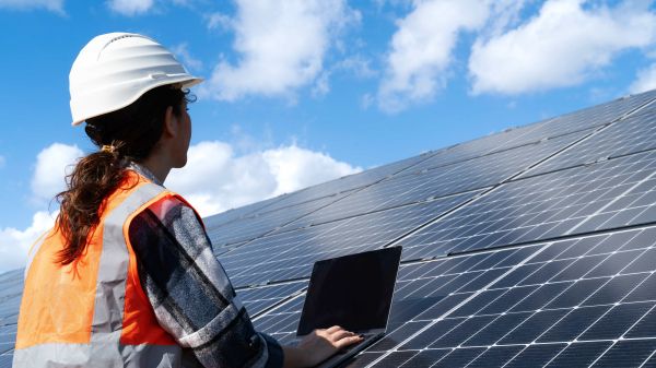 Engineer checking solar panels
