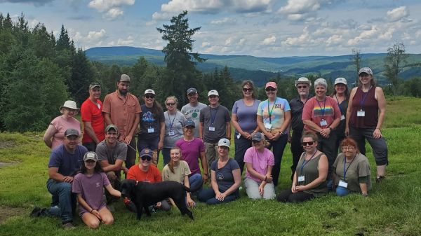 A group of educators gather at the Lundberg's property in Pittsburg, NH during the 2023 Forests of NH Teacher Tour to learn about wildife management techniques.