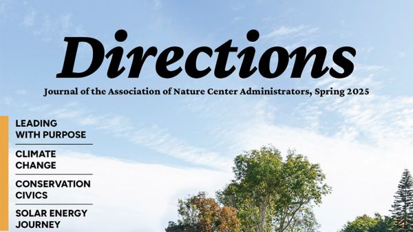 Spring 2025 Directions The cover of the Directions journal: A photo of children playing outdoors amid a winding path and sparse, desertous plants. In the background, a building stands amid trees.