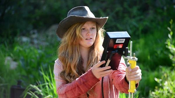 Teenage student uses technology to learn about soil and hydrology near Ephraim, Utah. Photo credit: BLM Utah