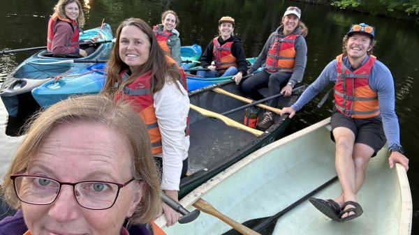 Picture of some participants from 2023 enjoying a peaceful paddle on the Saco River.