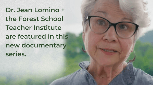 Dr. Jean Lomino stands outdoors beside a pond. Text reads, “Farm School’d is here! Dr. Jean Lomino + the Forest School Teacher Institute are featured in this new documentary series.”