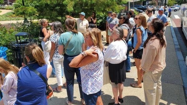 Participants take part in walking tour of Franklin Park with designer.