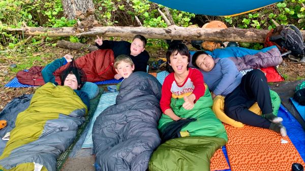 Call to Adventure for 10-12 year olds A group of young men wake up in their sleeping bags on the coast of the Olympic Peninsula