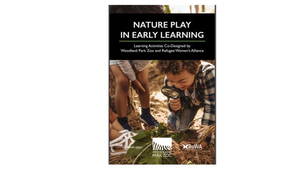 Nature Play in Early Learning The title, "NATURE PLAY IN EARLY LEARNING," is large and prominent, with a slightly darker text color. Underneath, smaller text specifies "Learning Activities Co-Designed by Woodland Park Zoo and Refugee Women's Alliance." The visual portion of the image features a young child, likely preschool age, with dark hair, crouched down on the ground, engaging in a learning activity.