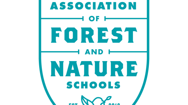 Badge shape with the writing "Eastern Region Association of Forest and Nature Schools"