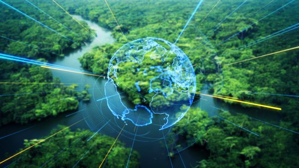 Free Climate Resources Lesson Plans A transparent outline of a globe on top of a landscape forest and river