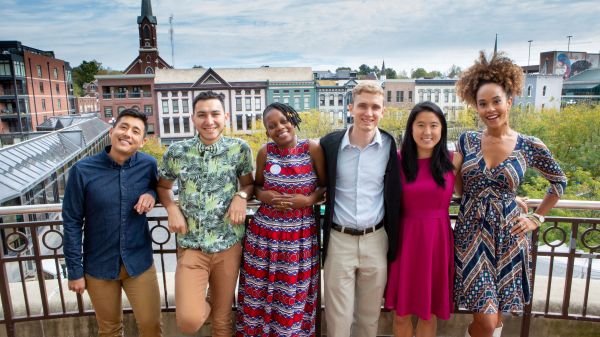 All of the panelists and moderators standing together outside