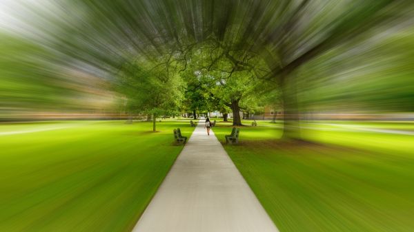 Student walking through college campus