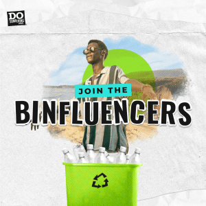 Image of a young person leading a recycling campaign. There is a recycling bin with bottles in it and the young person is looking out towards the future. Behind him there is a natural landscape