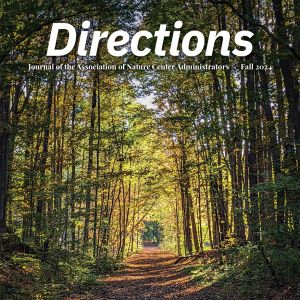 A magazine cover featuring a picture of a trail in early autumn. At the top, "Directions" in large text.