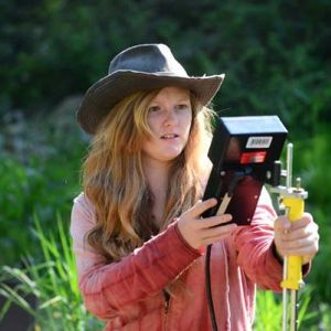 Teenage student uses technology to learn about soil and hydrology near Ephraim, Utah. Photo credit: BLM Utah