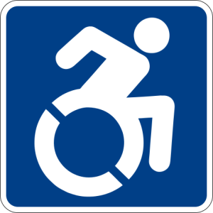 Image of a person self-propelling their wheelchair 