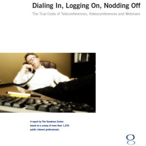 man behind desk asleep with telephone in hand