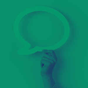 A green-tinted hand holds the shape of a speech bubble