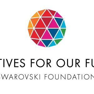 A white background displays a multicoloured geometric circular logo positioned above the text “Creatives for Our Future” and “Swarovski Foundation.”