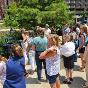 Participants take part in walking tour of Franklin Park with designer.