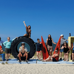 Certification Candidates at Virginia Love Sign on Beach