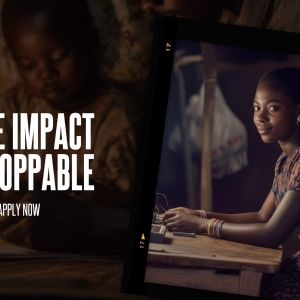 An image of a young girl working with a motherboard next to the text "Make Impact Unstoppable: Apply Now"