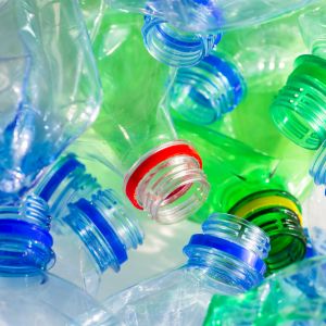 Closer up photograph of used plastic bottles ready for recycling