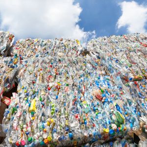 Gigantic bales of crushed plastics ready for recycling.