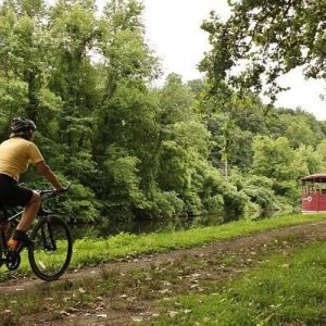 Person bicycling on historic trail