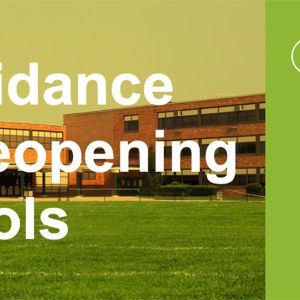 eeGuidance title in front of brick school building