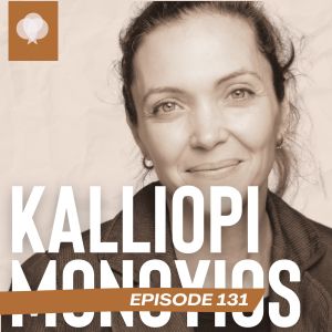 Toned image of a smiling woman with hair pulled back Her image is in the background behind her name.