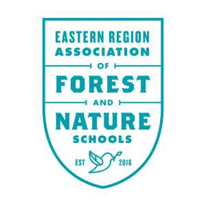 Badge shape with the writing "Eastern Region Association of Forest and Nature Schools"