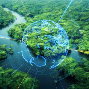 A transparent outline of a globe on top of a landscape forest and river