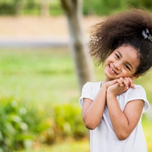 little girl smiling at camera 