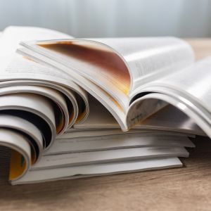 Stack of magazines on a desk