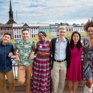 All of the panelists and moderators standing together outside