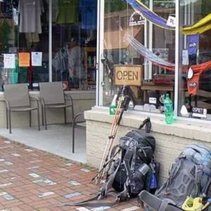 Backpacker outside retail store