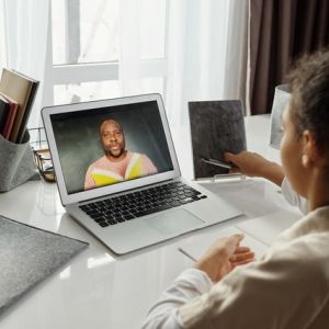 Little girl takes an online class
