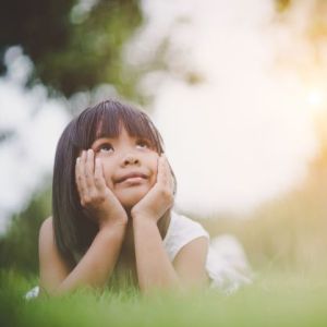 young girl looking up
