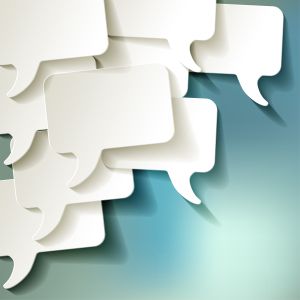 Chat speech bubbles vector white on blue bokeh background