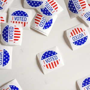 Photo of "I Voted" stickers on a white background