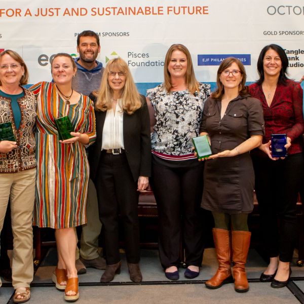 Most of the award winners standing together after the ceremony with Judy Braus