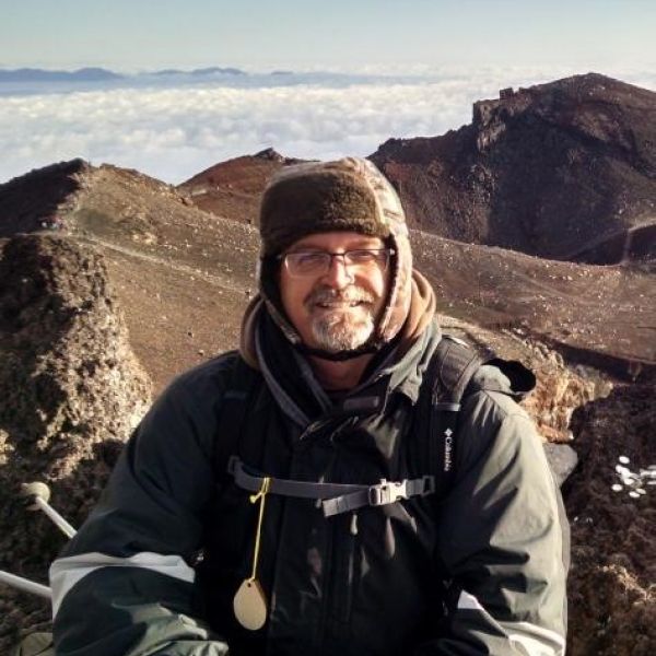Photo of Dr. David Allen on top of Mount Fuji