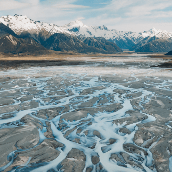 Landscape photo of mountains and braided river channels