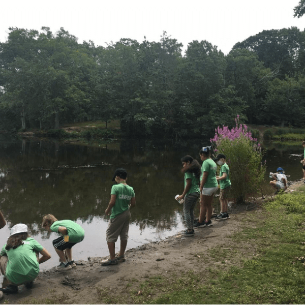 Gladstone Elementary School 21st CCLC and NOAA/NAAEE participants in the Mystic Aquarium program adopting their local watershed and doing a marine debris clean up.