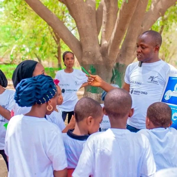 Victor Ayegba Mathew speaks to students outside