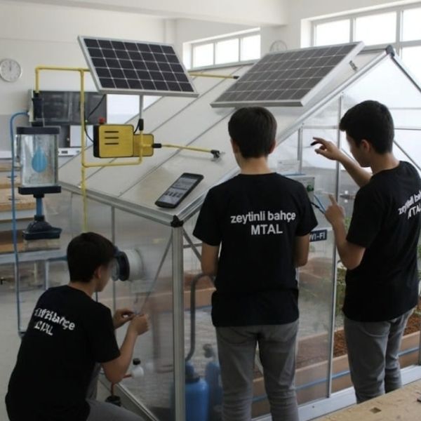 Students operate the smart greenhouse automation and solar-powered purification system